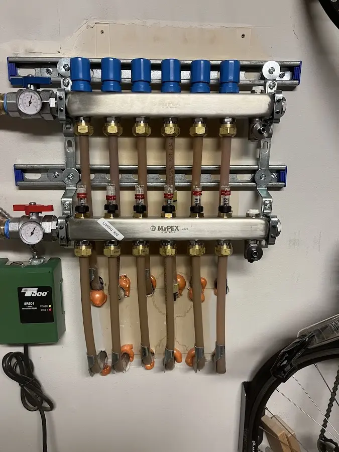 Plumber performing Leak Detection at a residential property in Inwood